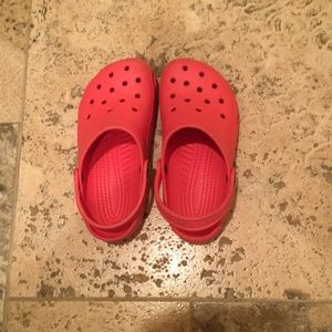 Girls size 12/13 coral crocs.